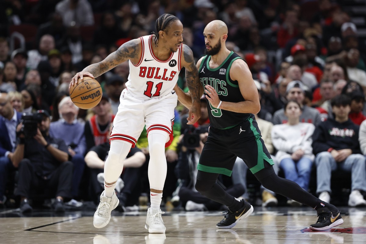 Boston Celtics guard Derrick White (9) defends against Chicago Bulls forward DeMar DeRozan (11) during the second half at United Center.