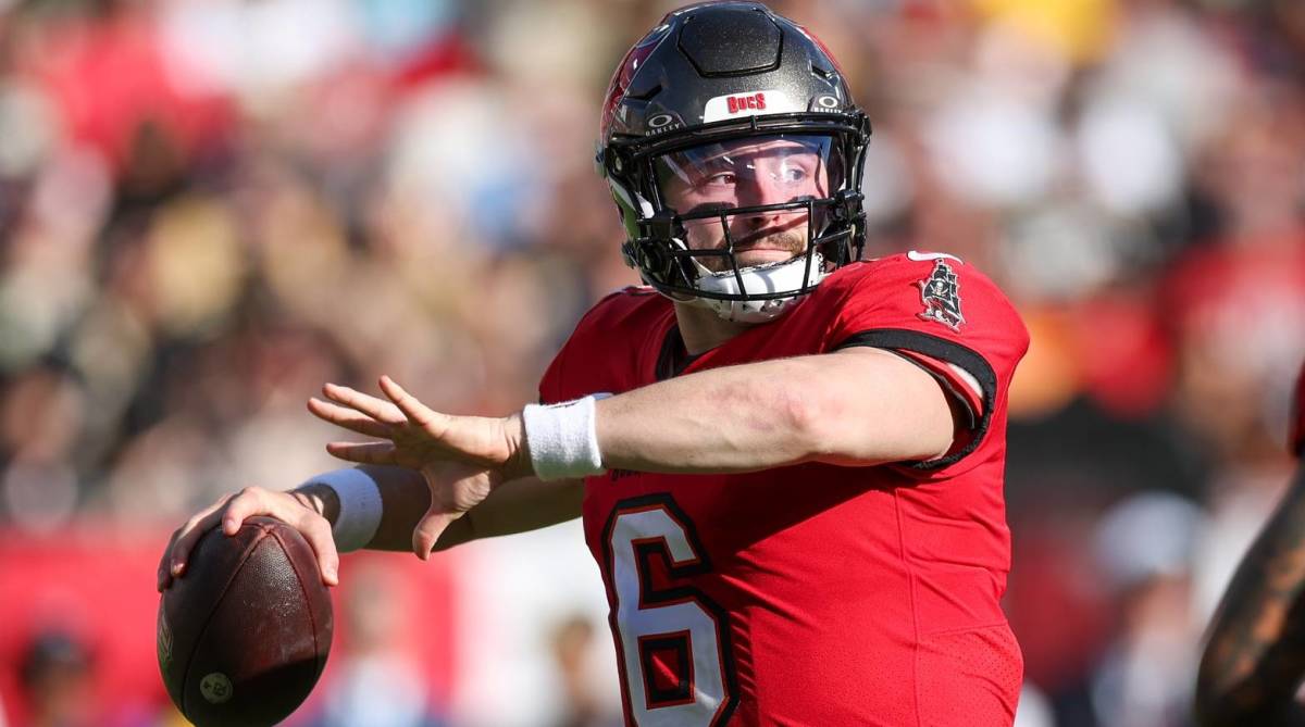 Buccaneers quarterback Baker Mayfield throws a pass in a game.