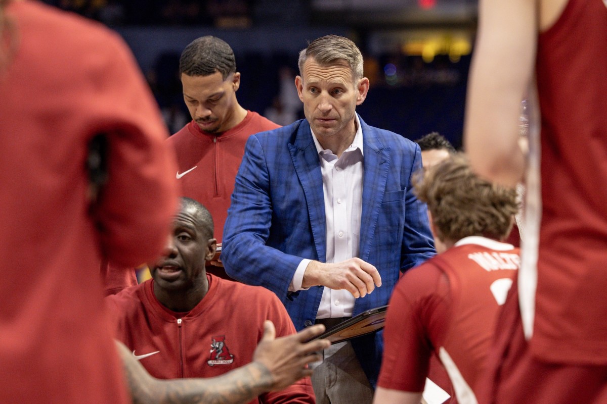 Alabama Crimson Tide head coach Nate Oats speaks to his players during a time out in the first half against the LSU Tigers at Pete Maravich Assembly Center in Baton Rouge, Louisiana, on Feb. 10, 2024.