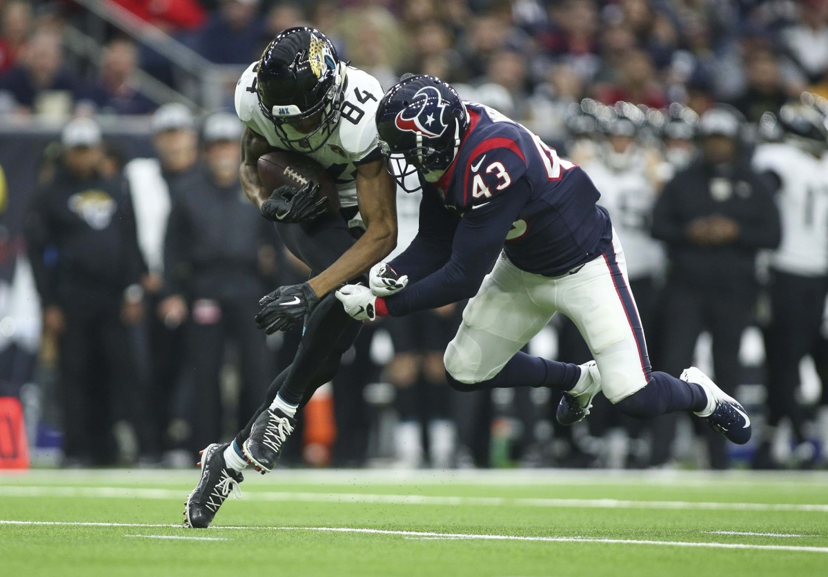 Dec 30, 2018; Houston, TX, USA; Jacksonville Jaguars wide receiver Keelan Cole (84) makes a reception as Houston Texans defensive back Shareece Wright (43) defends during the third quarter at NRG Stadium.