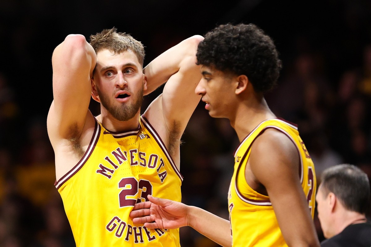 Feb 22, 2024; Minneapolis, Minnesota, USA; Minnesota Golden Gophers forward Parker Fox (23) reacts to a foul charge called against him during the second half against the Ohio State Buckeyes at Williams Arena.