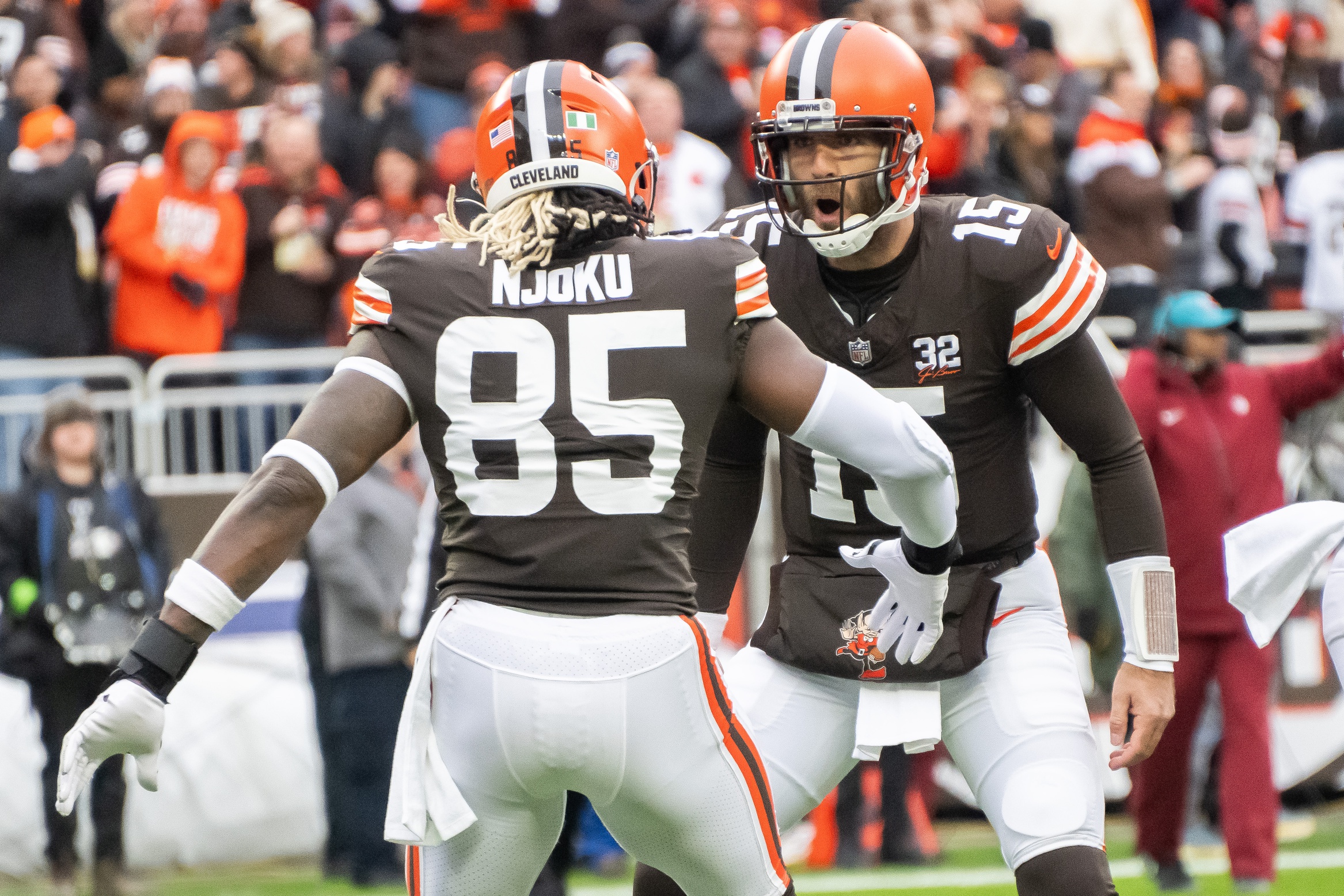Dec 10, 2023; Cleveland, Ohio, USA; Cleveland Browns quarterback Joe Flacco (15) and tight end David Njoku (85) celebrate after Flacco threw a touchdown to Njoku during the first quarter against the Jacksonville Jaguars at Cleveland Browns Stadium. Mandatory Credit: Ken Blaze-USA TODAY Sports