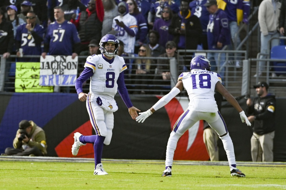 Nov 7, 2021; Baltimore, Maryland, USA; Minnesota Vikings quarterback Kirk Cousins (8) celebrates with wide receiver Justin Jefferson (18) after scoring a second quarter touchdown against the Baltimore Ravens at M&T Bank Stadium.