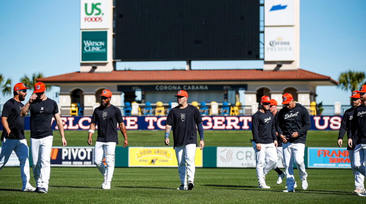 Detroit Tigers players warm up ahead of a spring training game.