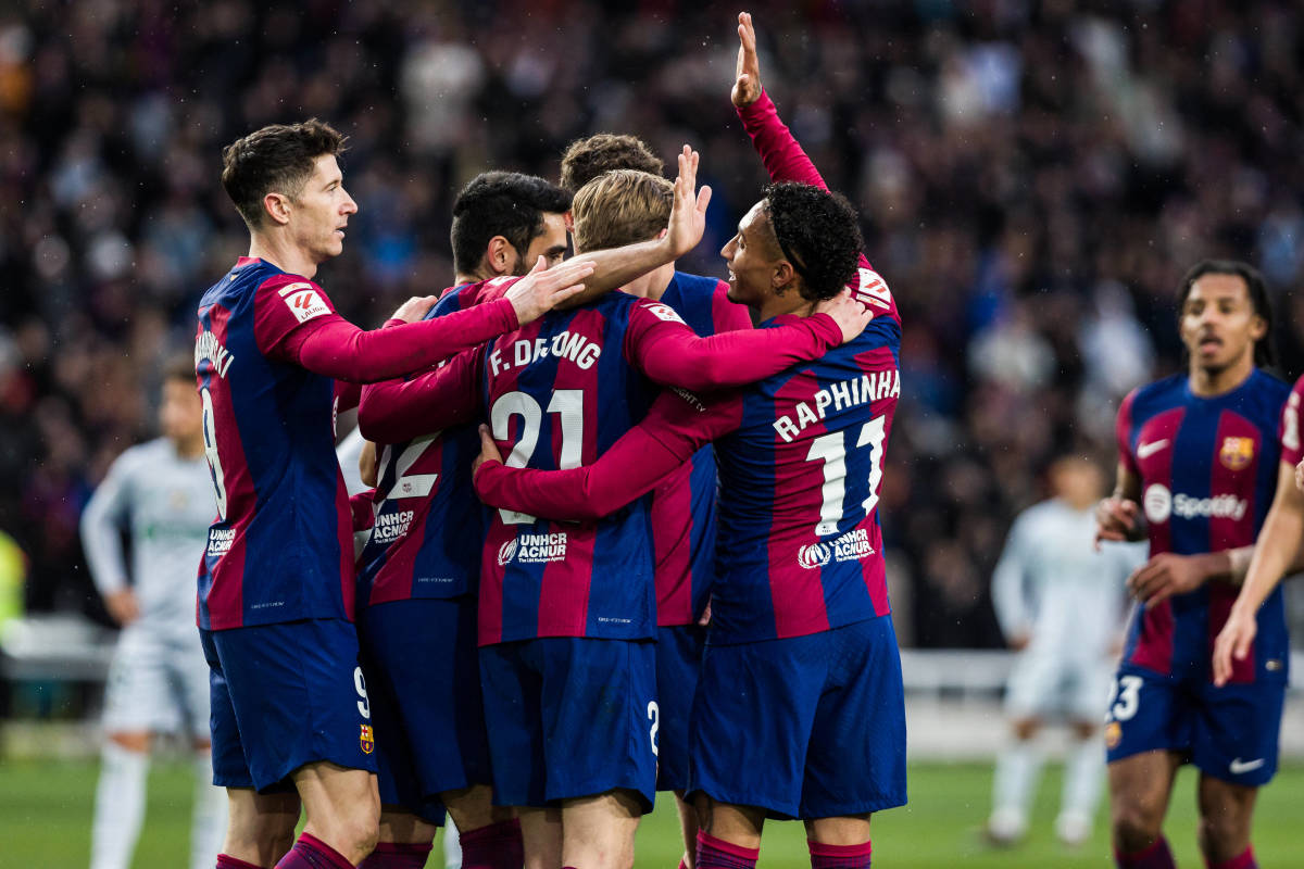 Barcelona players pictured celebrating a goal during a 4-0 win over Getafe in La Liga in February 2024