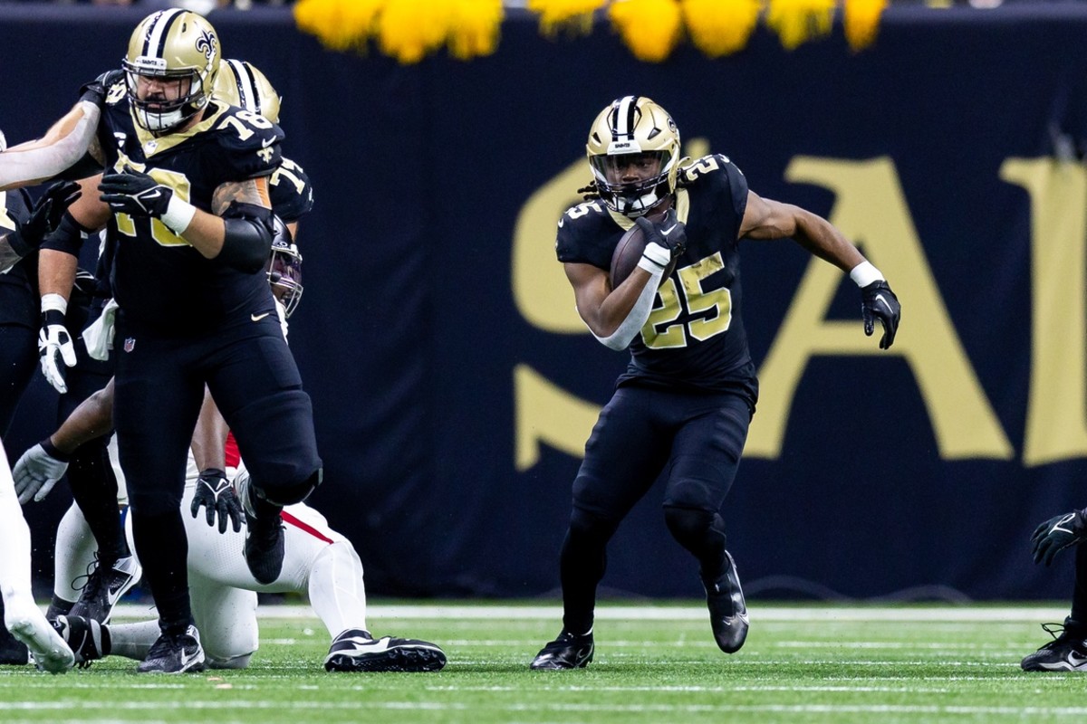 New Orleans Saints running back Kendre Miller (25) runs against the Atlanta Falcons. Mandatory Credit: Stephen Lew-USA TODAY