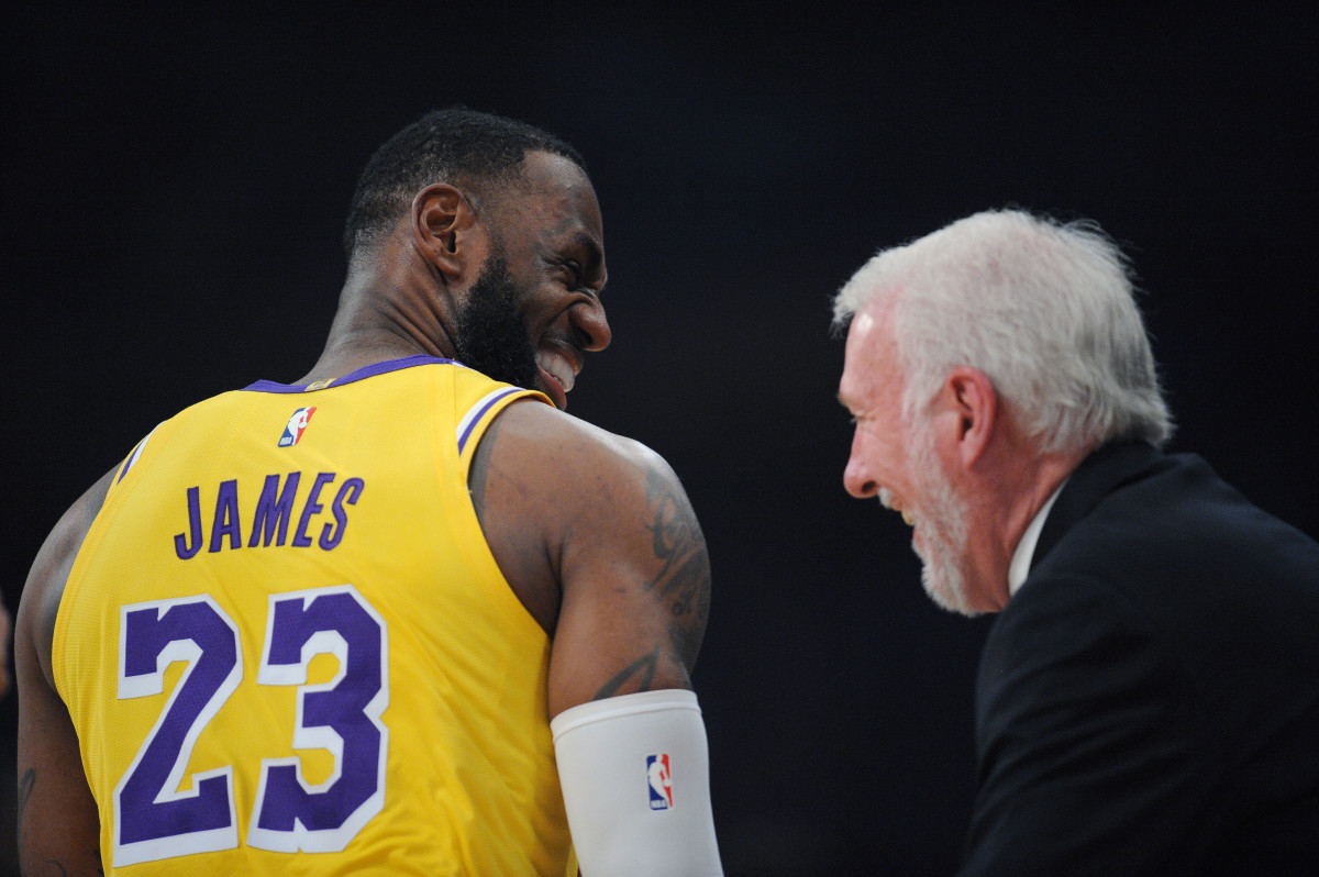 October 22, 2018; Los Angeles, CA, USA; Los Angeles Lakers forward LeBron James (23) meets with San Antonio Spurs head coach Gregg Popovich before the first half at Staples Center. Mandatory Credit: Gary A. Vasquez-USA TODAY Sports