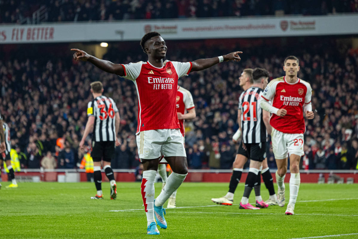 Bukayo Saka pictured (center) celebrating after scoring for Arsenal in a 4-1 win over Newcastle in February 2024