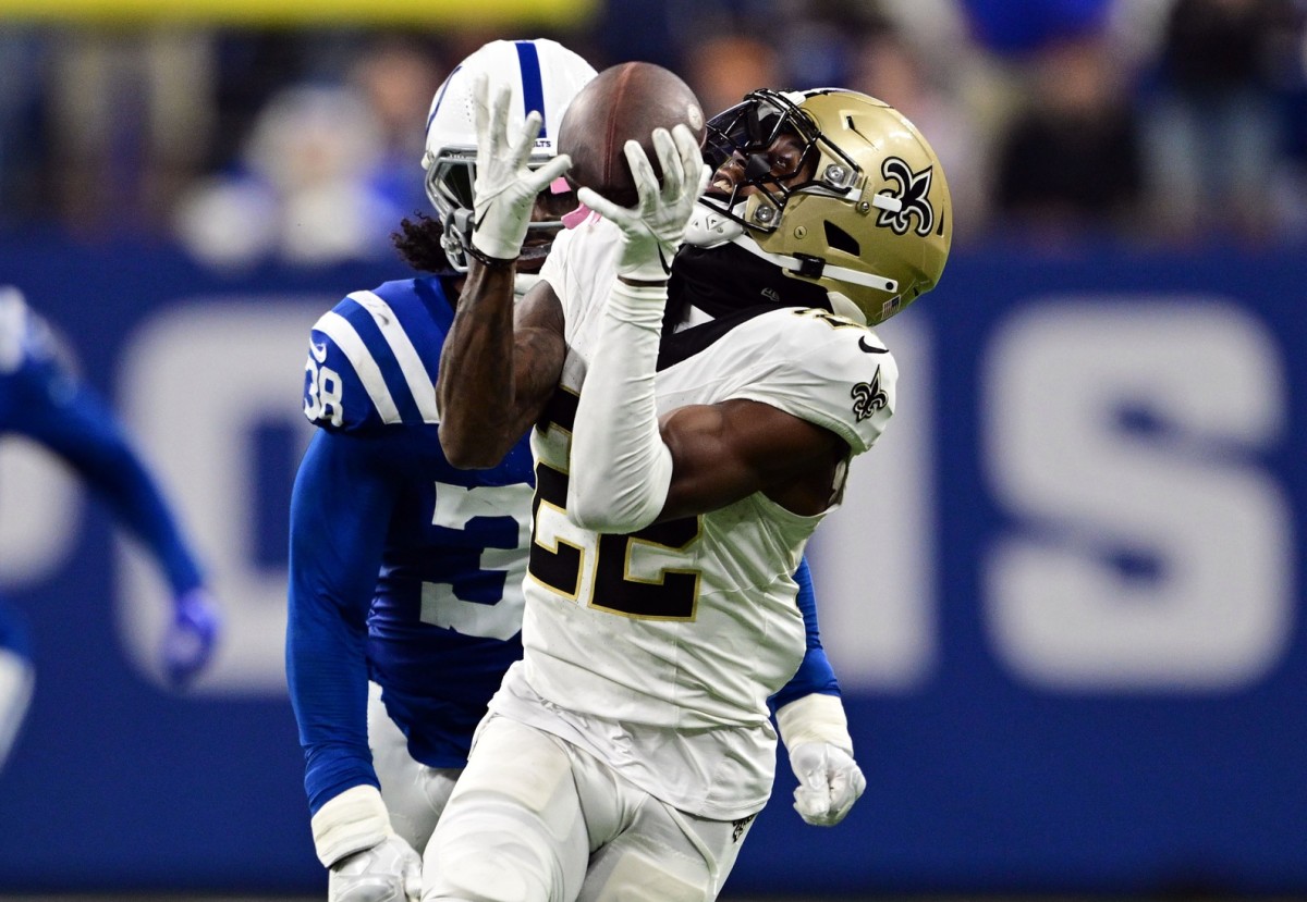 New Orleans Saints receiver Rashid Shaheed (22) catches a long pass behind Indianapolis Colts cornerback Tony Brown (38). Mandatory Credit: Marc Lebryk-USA TODAY Sports