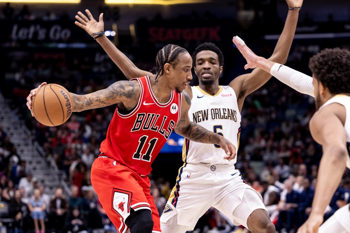 Chicago Bulls forward DeMar DeRozan (11) looks to pass the ball against New Orleans Pelicans forward Herbert Jones (5) during the second half at Smoothie King Center. 