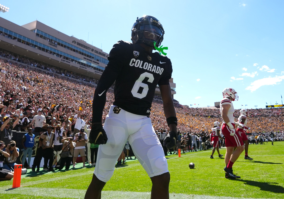 Colorado Buffaloes wide receiver Tar'Varish Dawson (6) reacts to his touchdown reception in the second quarter against the Nebraska Cornhuskers at Folsom Field