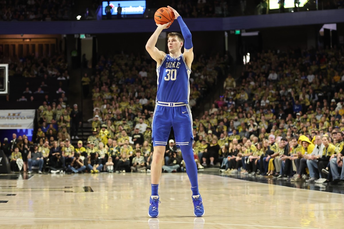 Duke Blue Devils center Kyle Filipowski (30) makes a three point shot during the second half against the Wake Forest Demon Deacons at Lawrence Joel Veterans Memorial Coliseum in Winston-Salem, North Carolina, on Feb. 24, 2024.