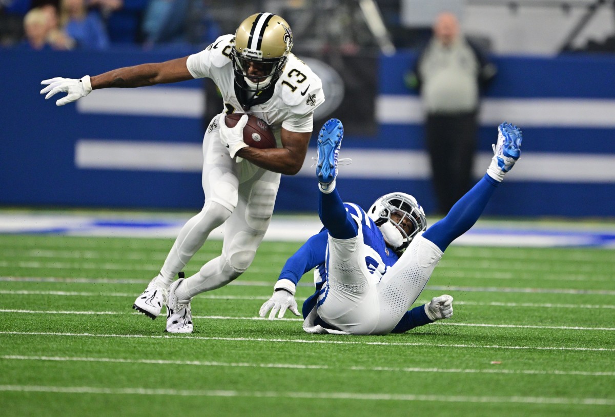 New Orleans Saints receiver Michael Thomas (13) breaks a tackle by Indianapolis Colts cornerback Tony Brown (38). Mandatory Credit: Marc Lebryk-USA TODAY