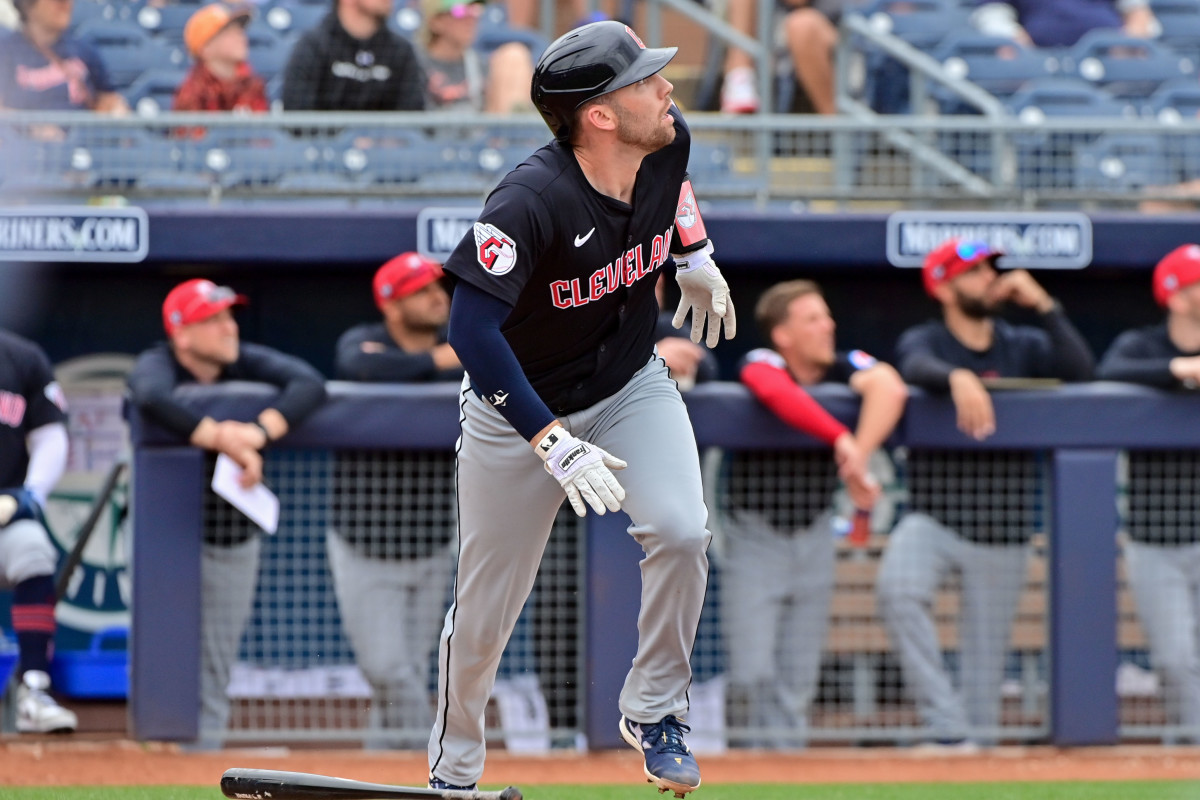 Feb 26, 2024; Peoria, Arizona, USA; Cleveland Guardians catcher David Fry (6) hits a two-run home run in the second inning against the San Diego Padres during a spring training game at Peoria Sports Complex.