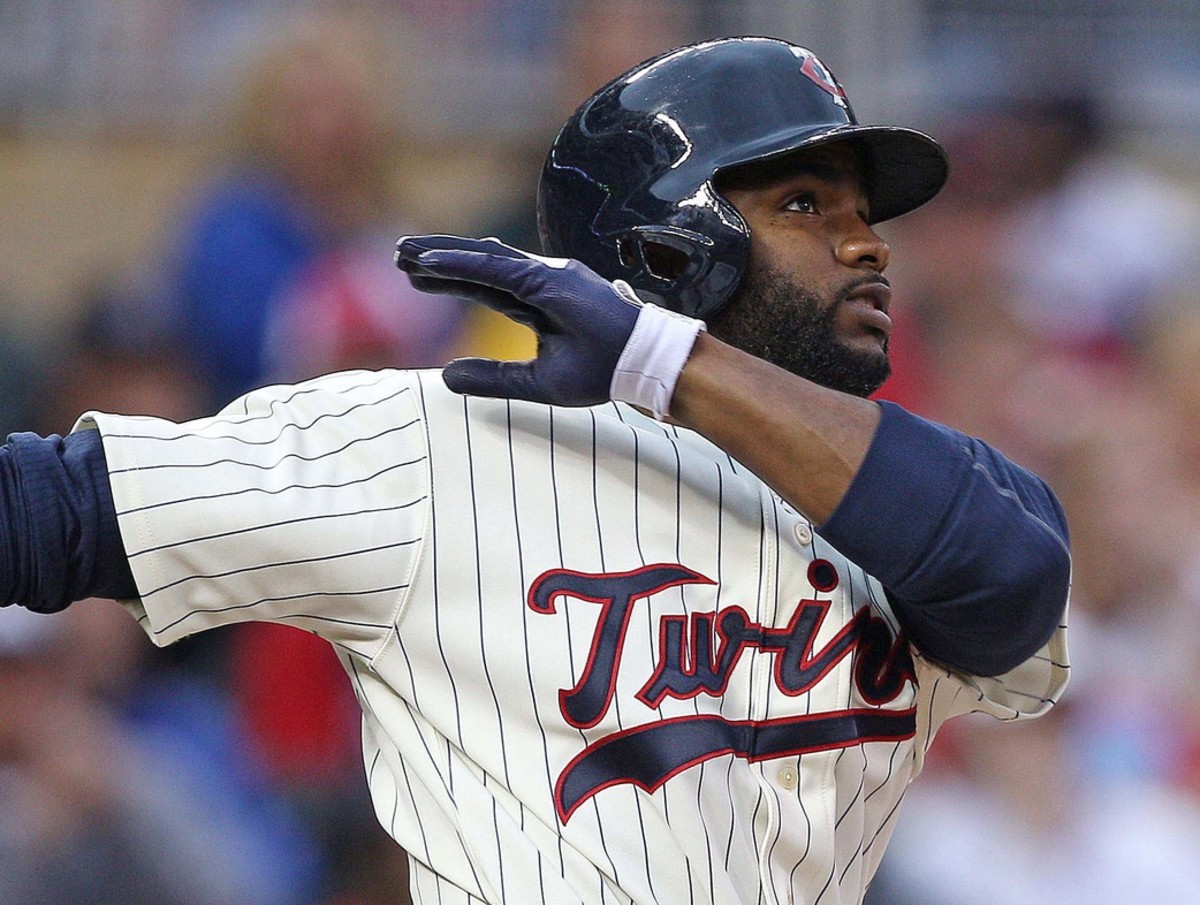 May 26, 2012; Minneapolis, MN, USA: Minnesota Twins center fielder Denard Span (2) hits a home run in the sixth inning against the Detroit Tigers at Target Field.