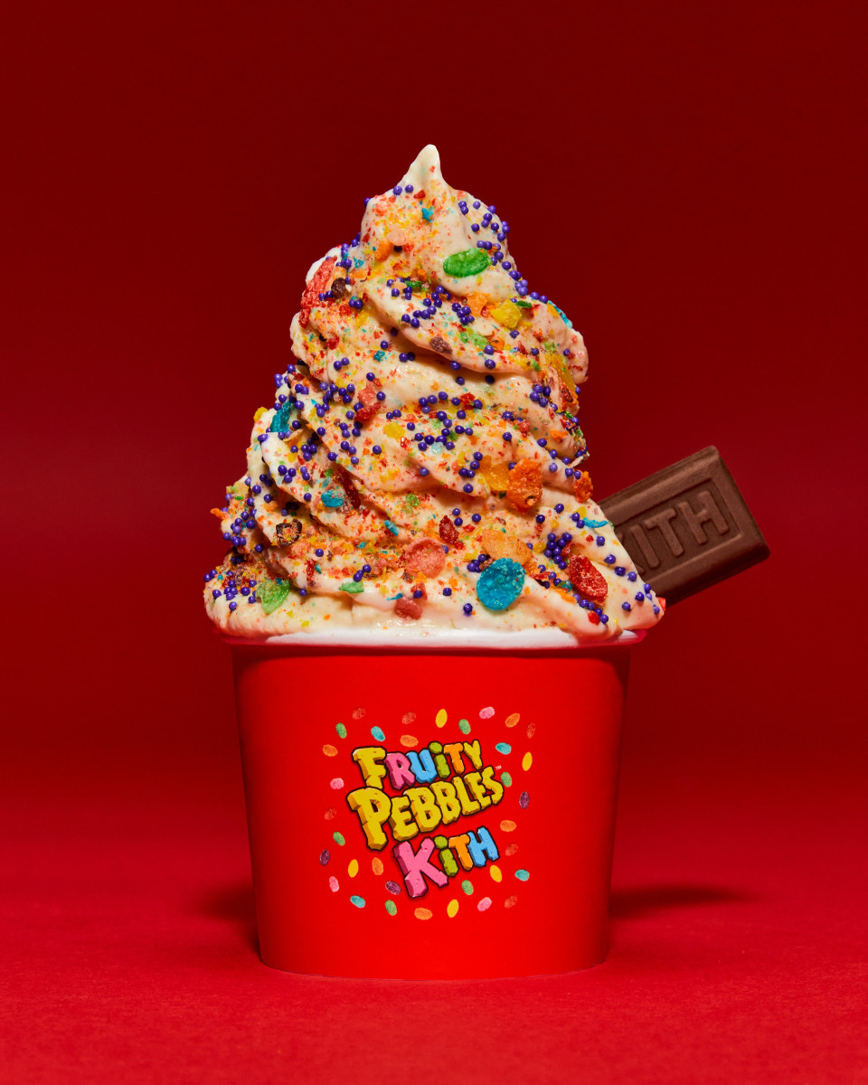 Ice cream topped with Fruity Pebbles cereal.