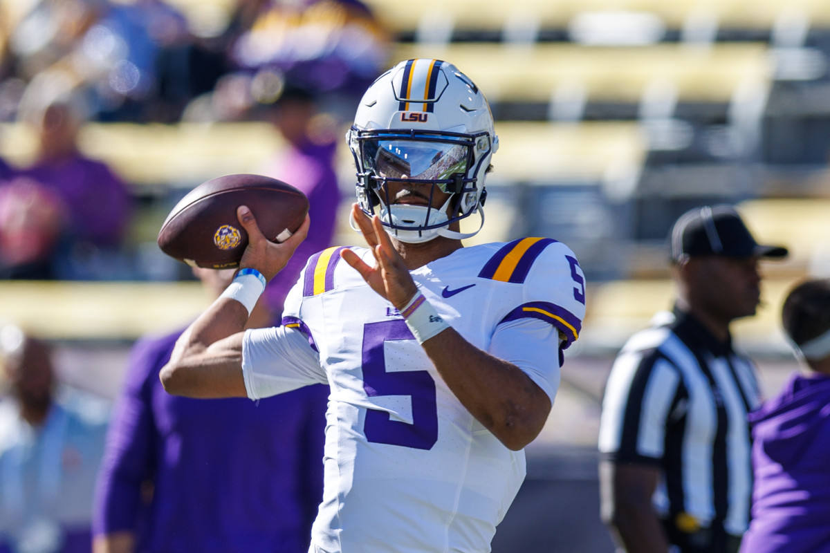 Nov 25, 2023; Baton Rouge, Louisiana, USA; LSU Tigers quarterback Jayden Daniels (5) during warmups before the game against the Texas A&M Aggies at Tiger Stadium. 