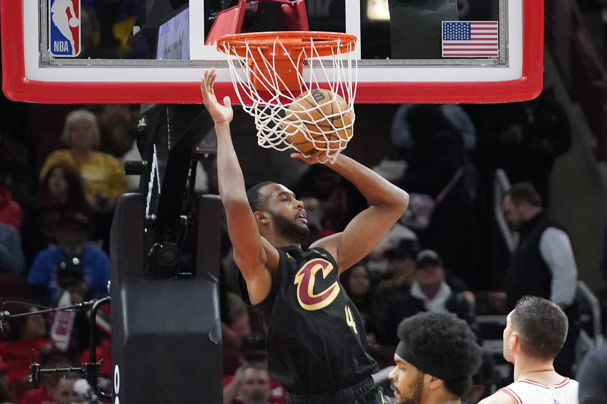 Feb 28, 2024; Chicago, Illinois, USA; Cleveland Cavaliers forward Evan Mobley (4) scores against the Chicago Bulls during the first quarter at United Center.