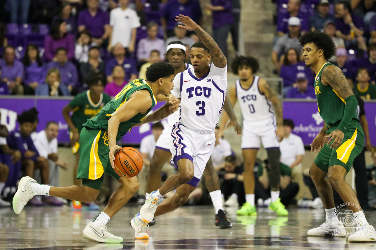 TCU's Avery Anderson III plays defense against Baylor's RayJ Dennis on February 26, 2024.