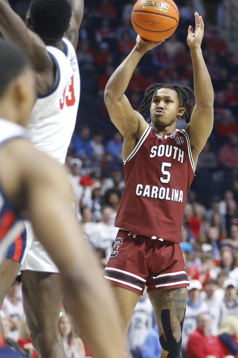 Meechie Johnson shoots a three-point basket during the first half against the Ole Miss Rebels (02-24-24)