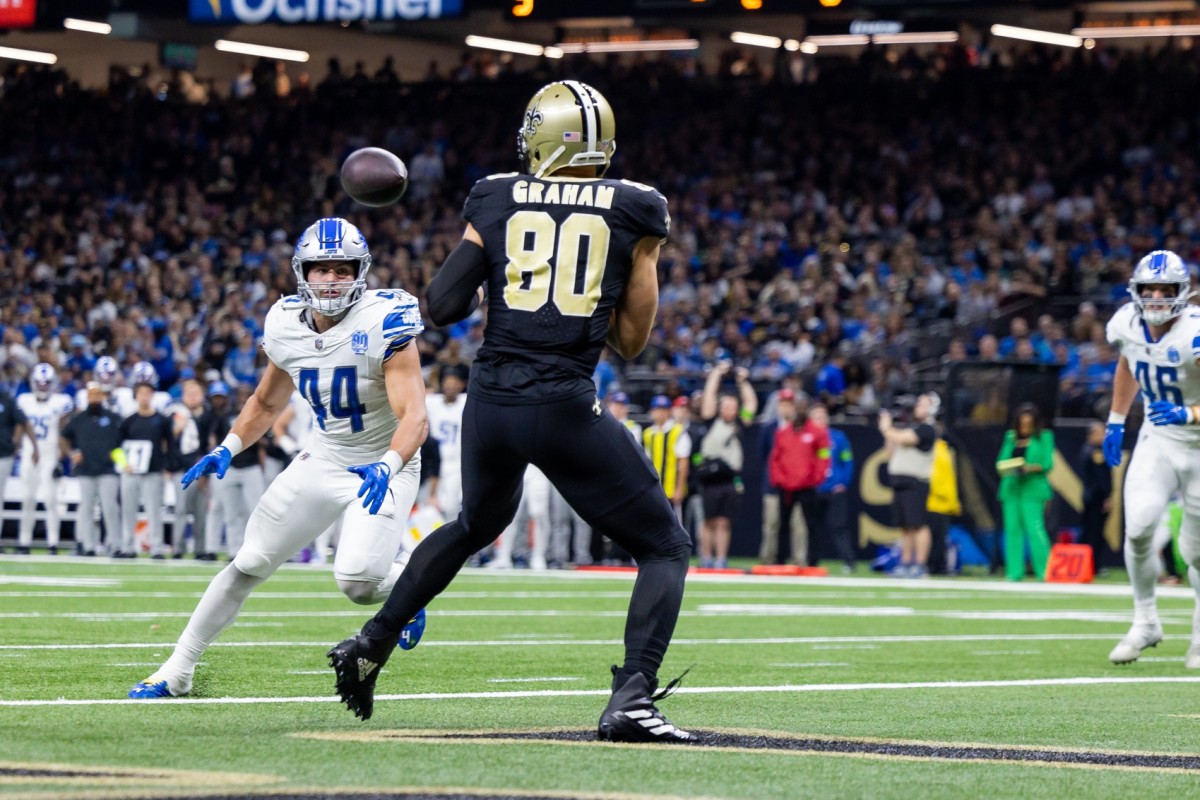 New Orleans Saints tight end Jimmy Graham (80) catches a touchdown over Detroit Lions linebacker Malcolm Rodriguez (44). Mandatory Credit: Stephen Lew-USA TODAY Sports