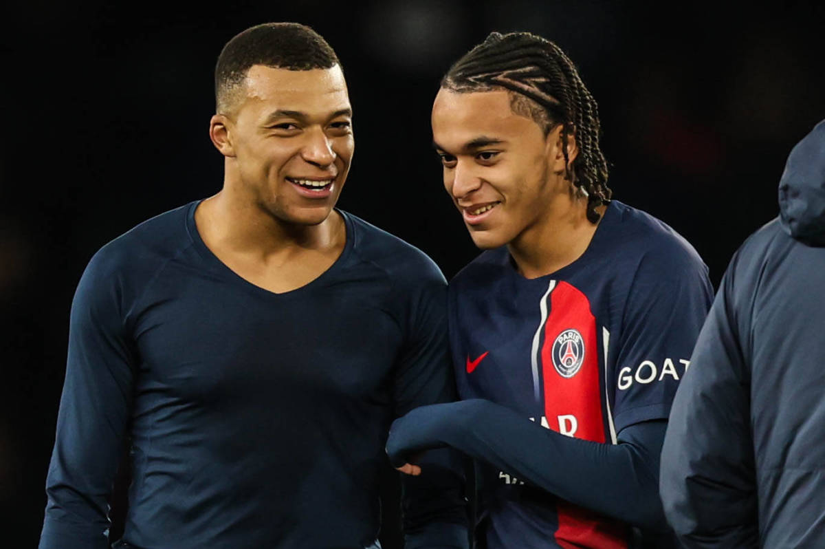 Kylian Mbappe (left) and brother Ethan Mbappe (right) pictured in December 2023 after Paris Saint-Germain's Ligue 1 game against Metz at the Parc des Princes