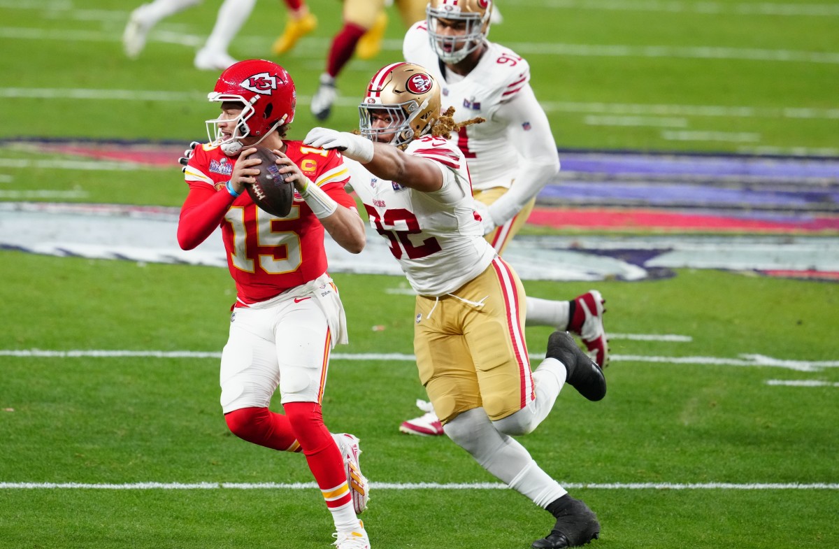 Kansas City Chiefs quarterback Patrick Mahomes (15) is pressured by San Francisco 49ers defensive end Chase Young (92) during Super Bowl LVIII. Mandatory Credit: Stephen R. Sylvanie-USA TODAY Sports
