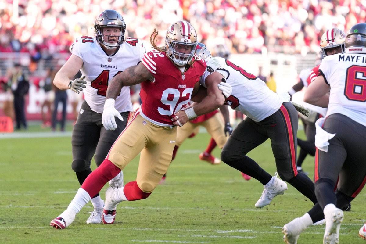 San Francisco 49ers defensive end Chase Young (92) rushes past Tampa Bay Buccaneers tight end Cade Otton (right). Mandatory Credit: Darren Yamashita-USA TODAY Sports