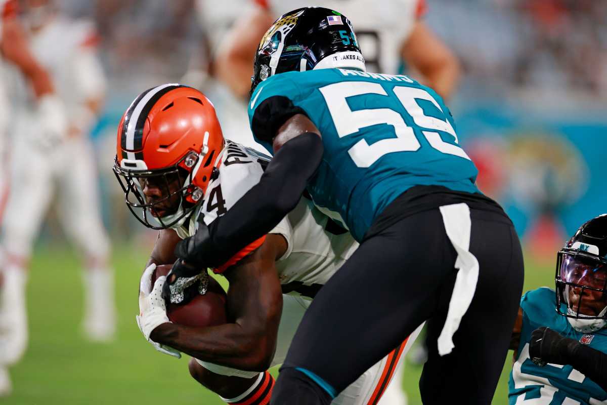 Jacksonville Jaguars linebacker Tyrell Adams #59 forces a fumble on Cleveland Browns running back Jerome Ford #34 during the fourth quarter of a preseason NFL game Friday, Aug. 12, 2022 at TIAA Bank Field in Jacksonville. The Cleveland Browns defeated the Jacksonville Jaguars 24-13. [Corey Perrine/Florida Times-Union] Jacksonville Jaguars 2022 Cleveland Browns First Home Pre Season Scrimmage Second Scrimmage Preseason
