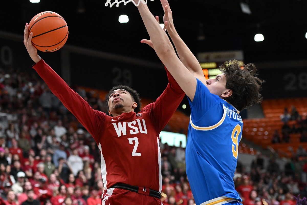 Washington State Cougars guard Myles Rice (2) shoots the ball against UCLA Bruins forward Berke Buyuktuncel (9) in the second half at Friel Court at Beasley Coliseum in Pullman, Washington, on March 2, 2024. Washington State Cougars won 77-65.