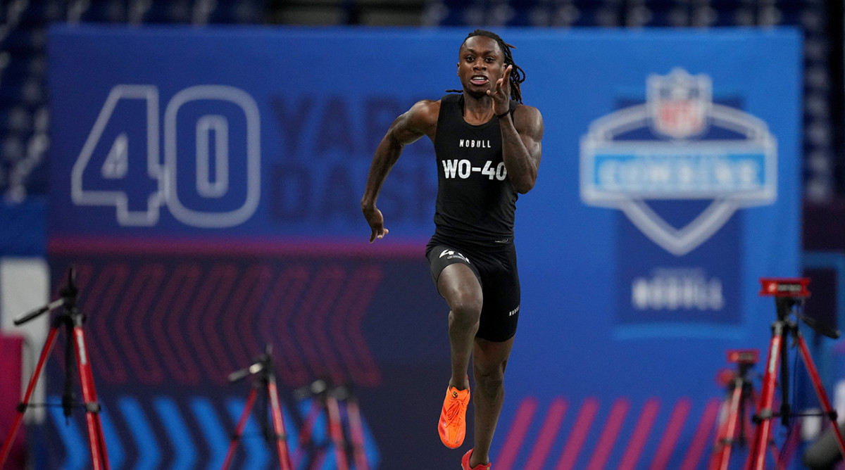 Texas wide receiver Xavier Worthy (WO40) running the 40-yard dash at the 2024 NFL scouting combine.