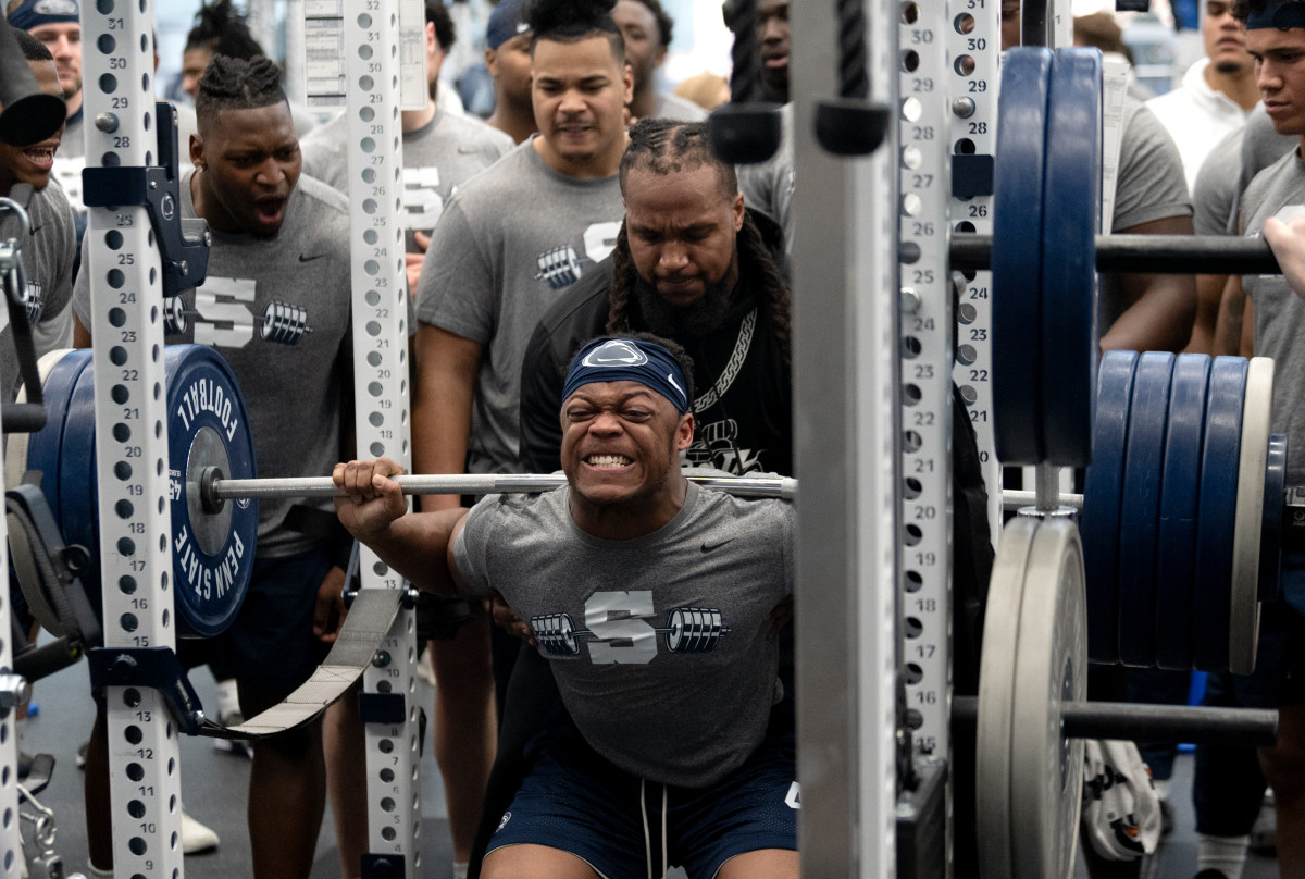 Penn State linebacker Kobe King goes through a lifting drill during the Nittany Lions' max-out session at the Lasch Football Building.