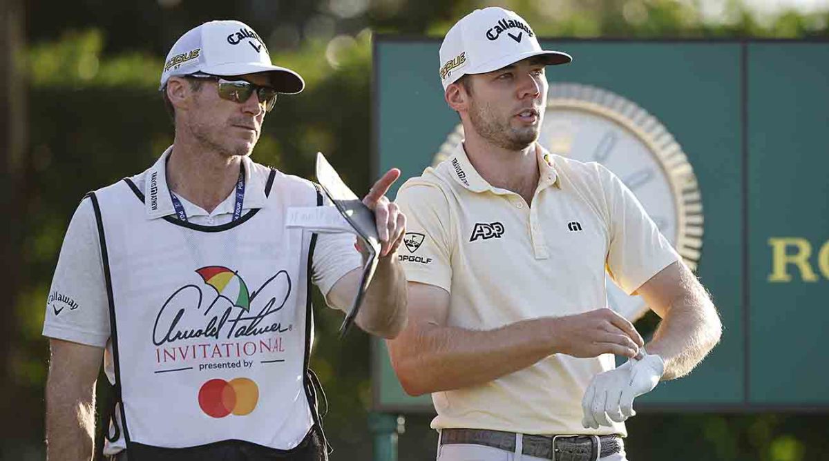 Sam Burns talks with caddie Travis Perkins during the 2022 Arnold Palmer Invitational Bay Hill Club in Orlando, Fla.