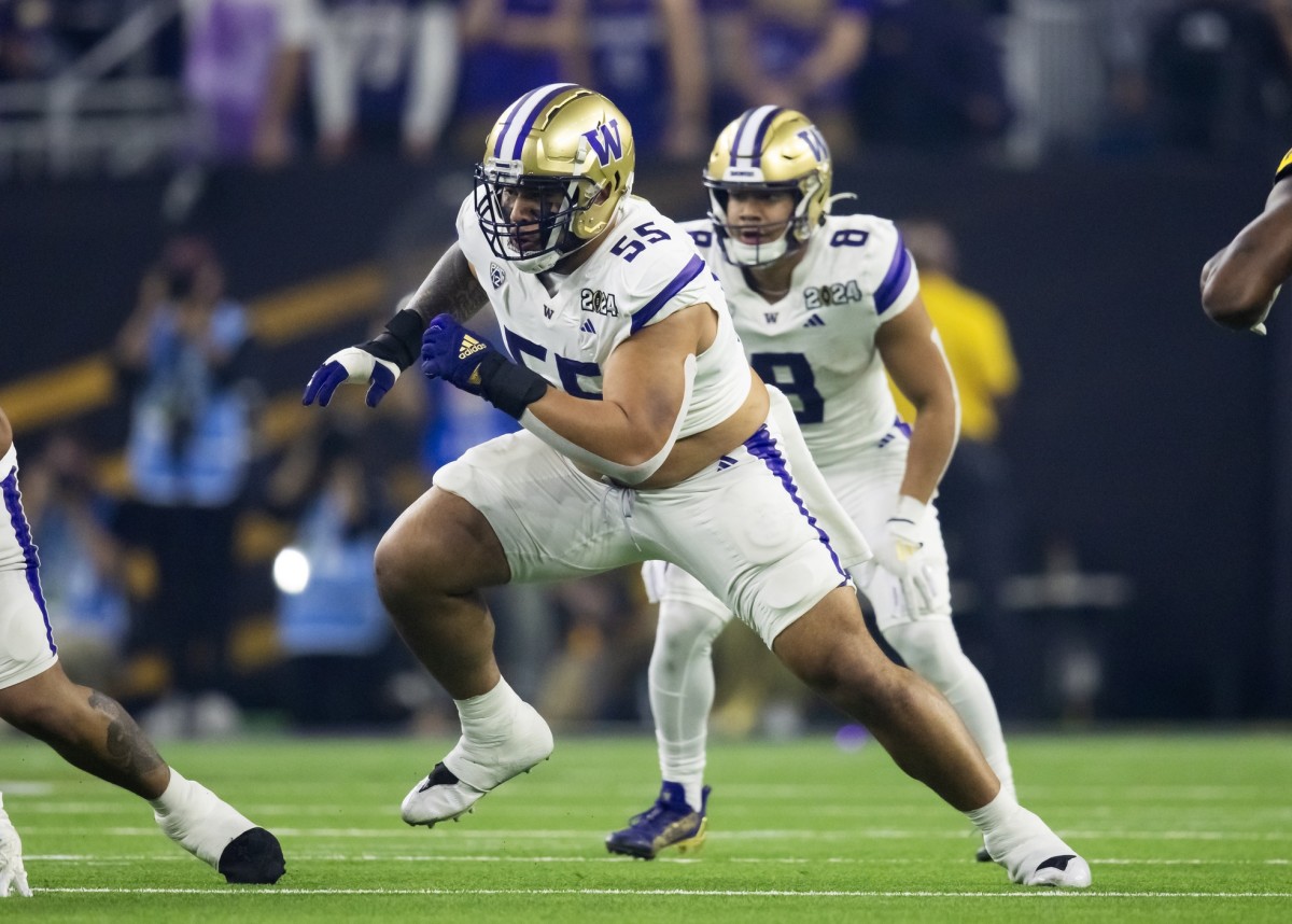 Washington Huskies offensive lineman Troy Fautanu (55) against the Michigan Wolverines during the 2024 College Football Playoff national championship game. Mandatory Credit: Mark J. Rebilas-USA TODAY Sports