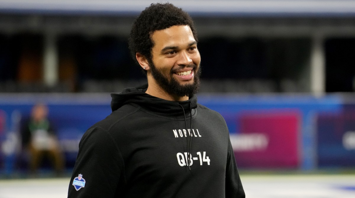 Former USC quarterback Caleb Williams smiles during the 2024 NFL Combine at Lucas Oil Stadium.