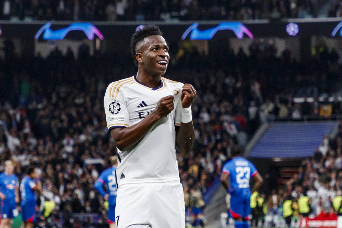 Vinicius Junior pictured celebrating after scoring for Real Madrid against RB Leipzig in March 2024