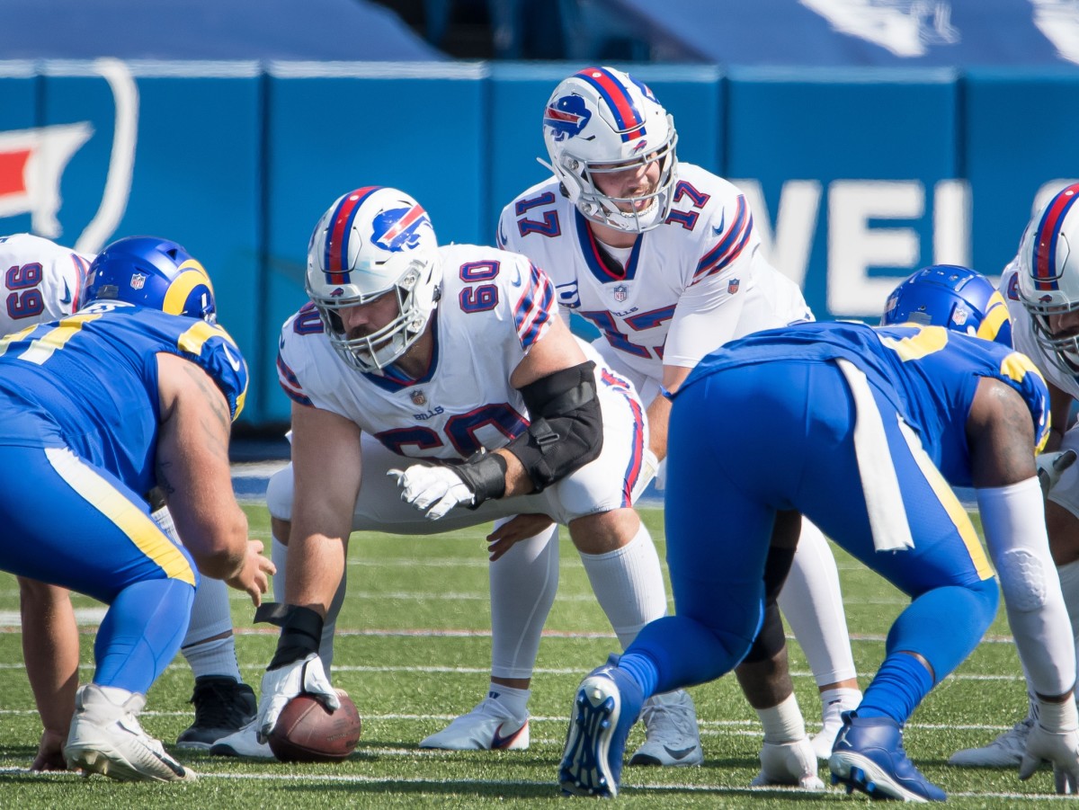 Sep 27, 2020; Orchard Park, New York, USA; Buffalo Bills quarterback Josh Allen (17) at the line of scrimmage with center Mitch Morse (60) in the second quarter of a game against the Los Angeles Rams at Bills Stadium.