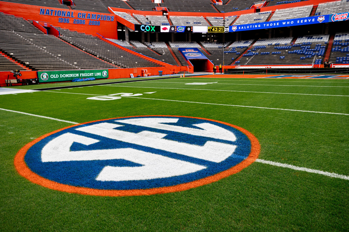 The SEC logo in orange and blue colors is painted on the field before the game between the Florida Gators and Arkansas Razorbacks at Steve Spurrier Field at Ben Hill Griffin Stadium in Gainesville, FL on Saturday, November 4, 2023. [Matt Pendleton/Gainesville Sun]