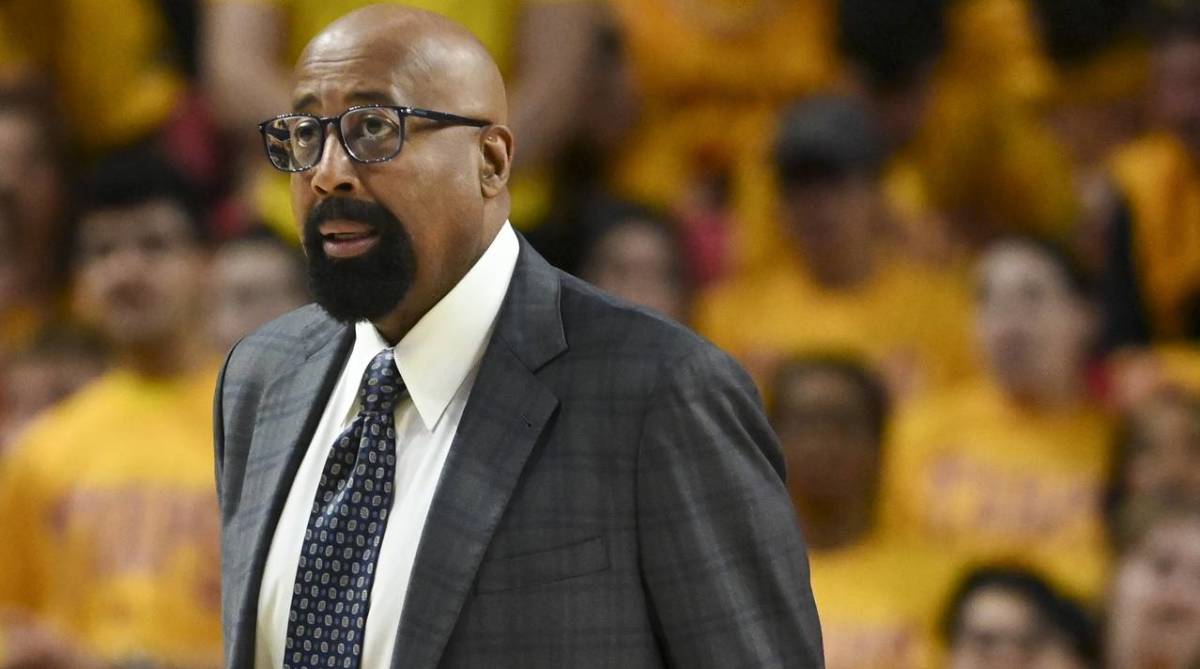 Indiana head coach Mike Woodson looks on while coaching in a game.