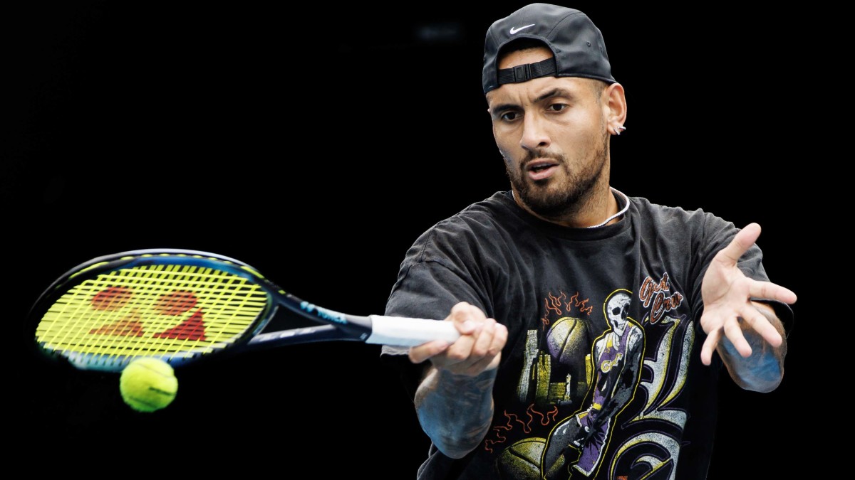 Nick Kyrgios of Australia hits a shot during a practice session on court 16 at Melbourne Park
