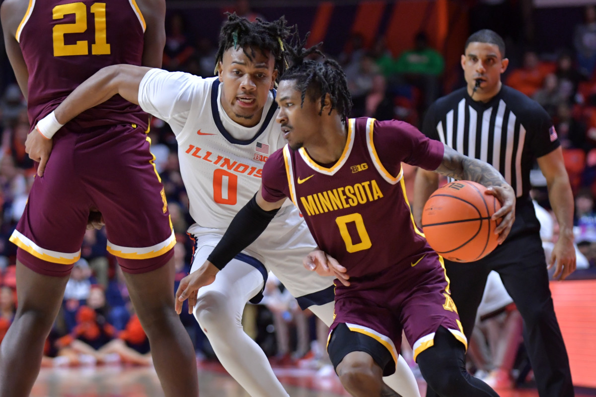 Minnesota guard Elijah Hawkins (0) drives the ball past Illinois guard Terrence Shannon Jr. (0) during the second half at State Farm Center in Champaign, Ill., on Feb. 28, 2024.