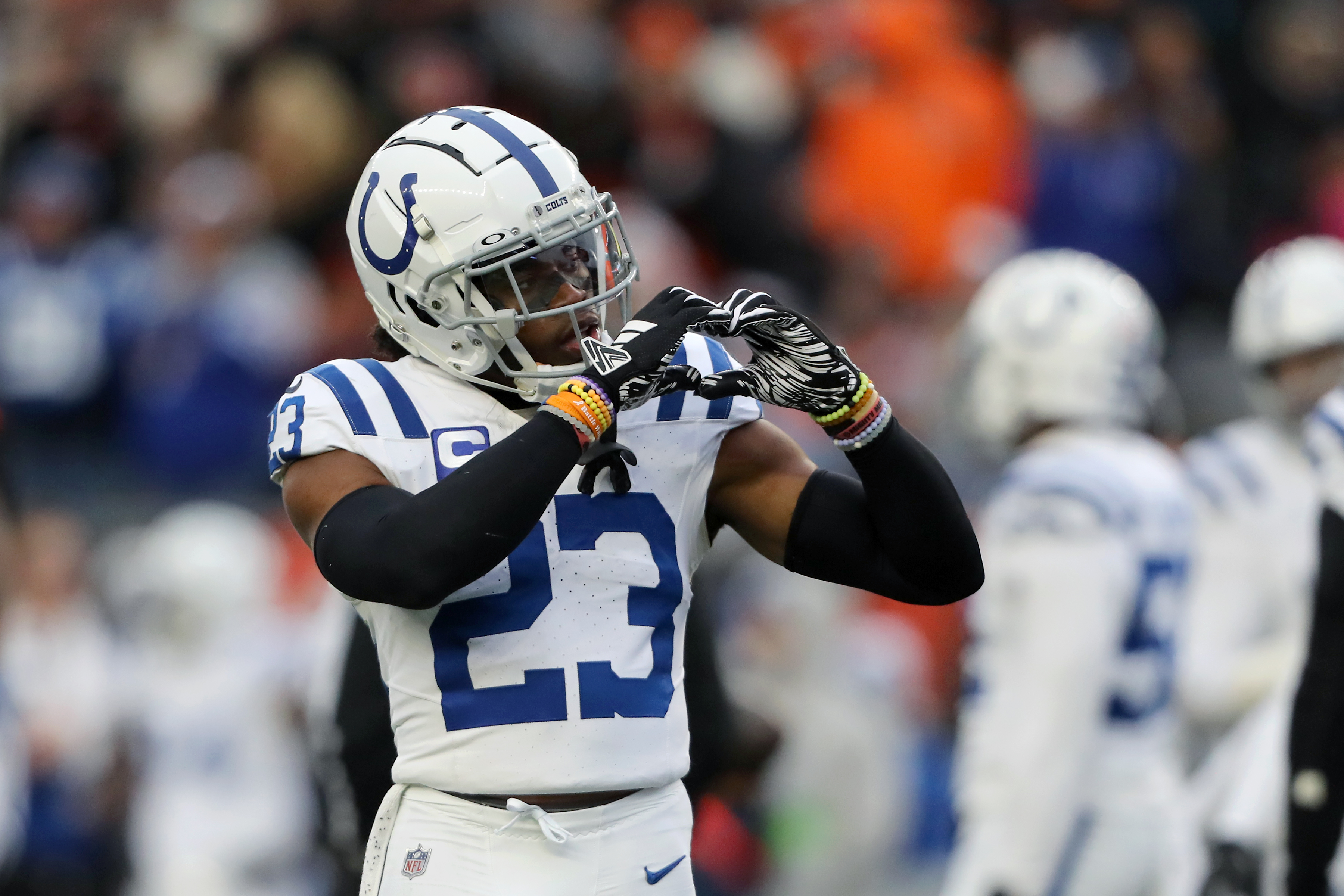 Dec 10, 2023; Cincinnati, Ohio, USA; Indianapolis Colts cornerback Kenny Moore II (23) reacts by making the heart sign to approve a call from the officials during the second half against the Cincinnati Bengals at Paycor Stadium.
