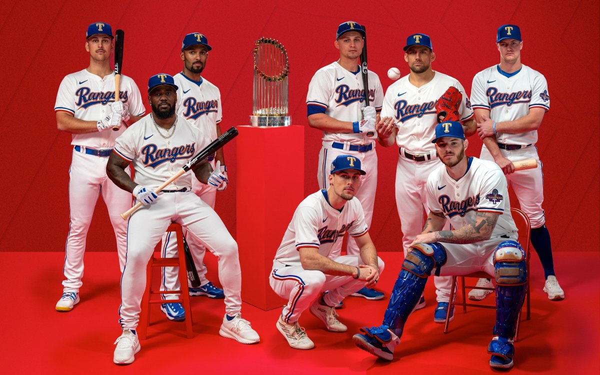 The Texas Rangers revealed their gold-trimmed World Series championship uniforms and caps in a series of social media posts on Thursday. The jerseys and caps will be available to fans on March 21.