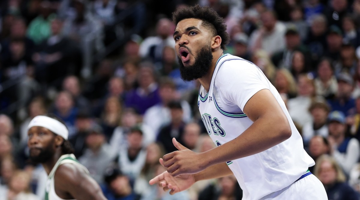 Minnesota Timberwolves center Karl-Anthony Towns (32) reacts to his missed shot against the Milwaukee Bucks during the second half at Target Center in Minneapolis, Minnesota, on Feb. 23, 2024.