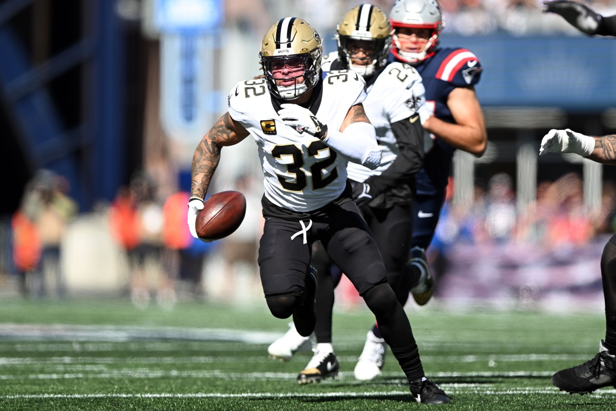New Orleans Saints safety Tyrann Mathieu (32) returns an interception for a touchdown against the New England Patriots. Mandatory Credit: Brian Fluharty-USA TODAY