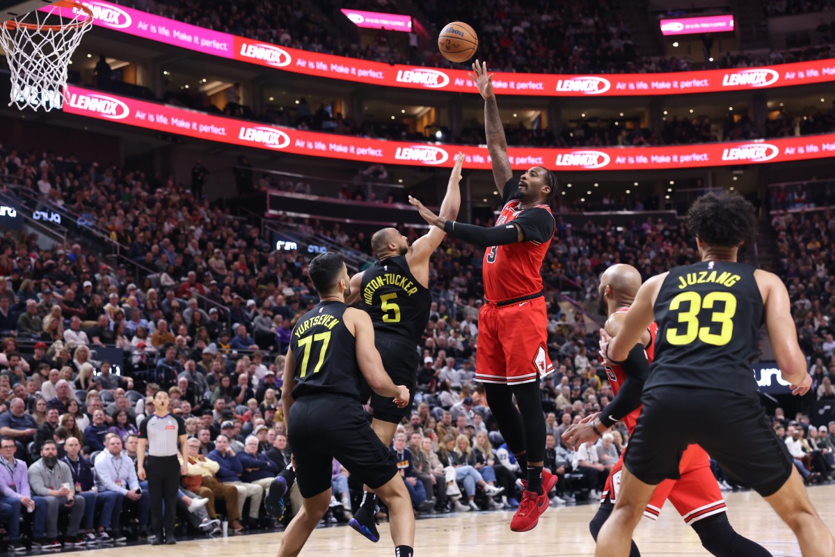 Chicago Bulls center Andre Drummond (3) shoots over Utah Jazz guard Talen Horton-Tucker (5) during the third quarter at Delta Center.