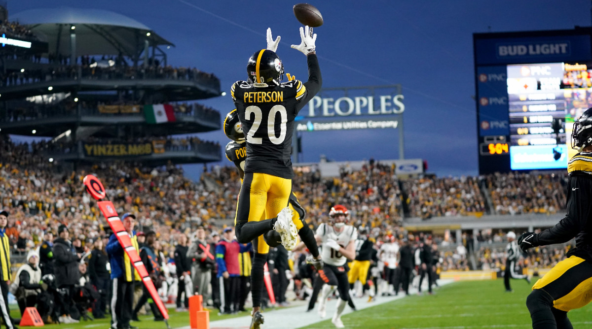 Dec 23, 2023; Pittsburgh, PA, USA; Pittsburgh Steelers cornerback Patrick Peterson (20) intercepts a pass in the first quarter during a Week 16 NFL football game between the Cincinnati Bengals and the Pittsburgh Steelers at Acrisure Stadium.