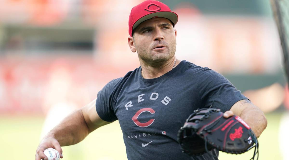 Reds first baseman Joey Votto throws a ball in warmups before a game.