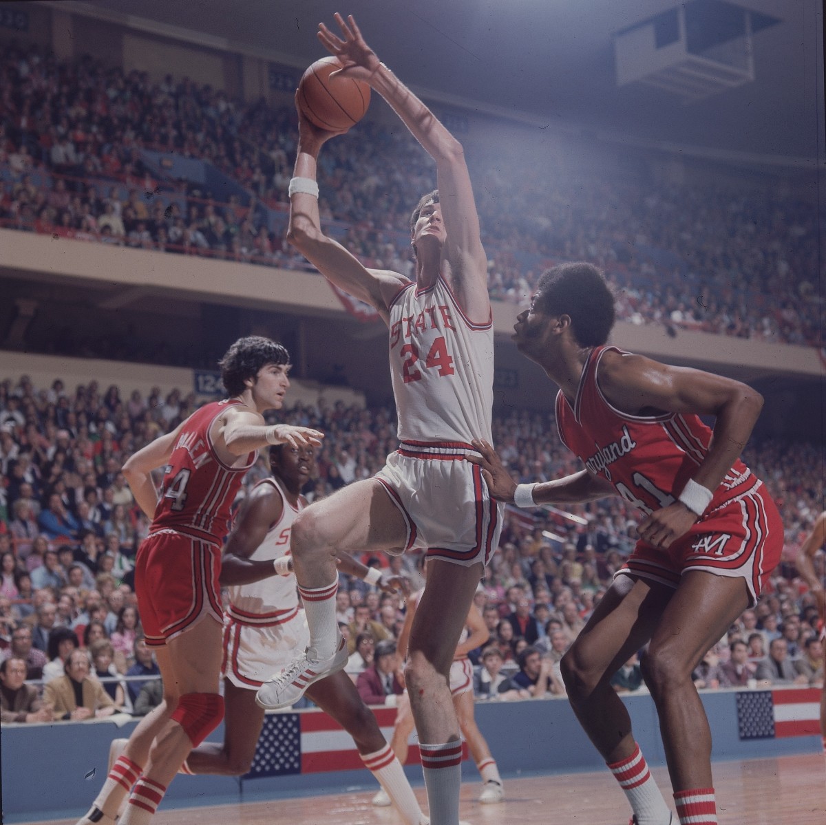 NC State's Tommy Burleson goes to the basket against Maryland in the 1974 ACC tournament final.