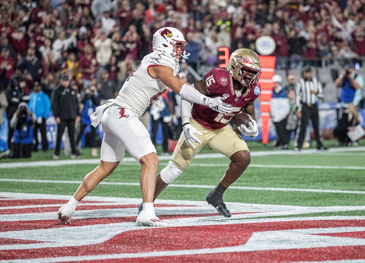 FSU linebacker Tatum Bethune (15) came up with a critical interception in the end zone as the Louisville Cardinals faced off against the Florida State Seminoles at Bank of America Field in Charlotte, NC. FSU defeated Louisville 16-6 to win the 2023 ACC Championship. Dec. 2, 2023.  